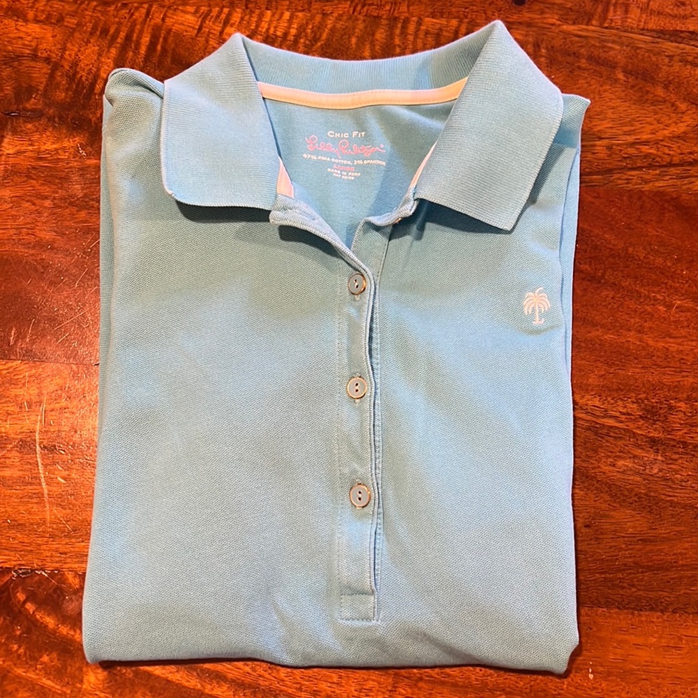 Lilly Pulitzer turquoise blue chic fit polo.Fit is flattering/a bit form fitting